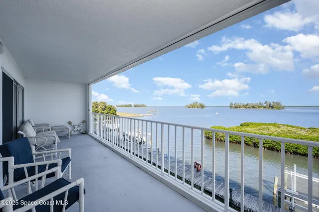 a view of a lake from a balcony