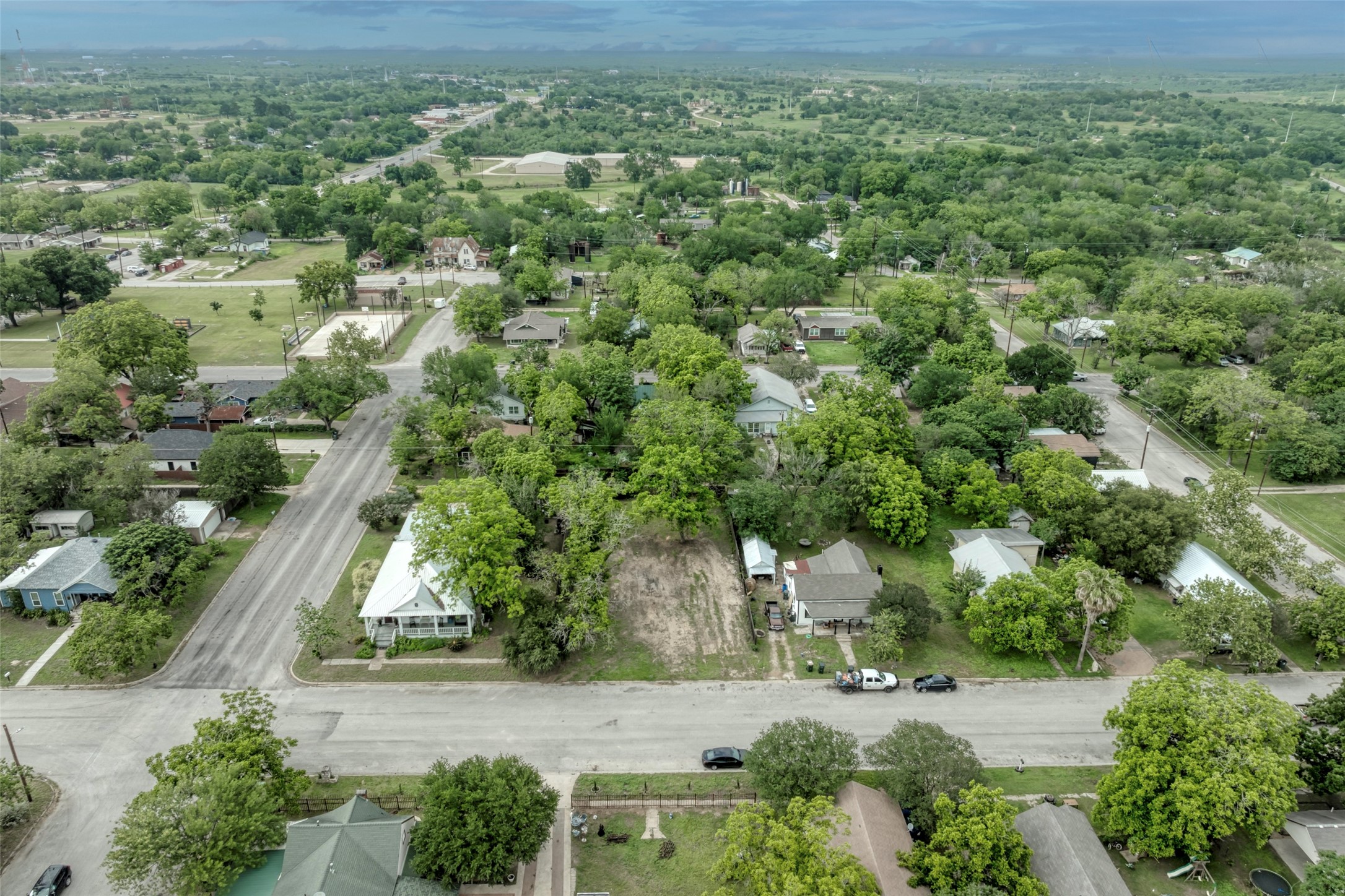 809 East Fannin Street Luling, TX 78648 - Photo 8 of 16 an aerial view of a house with a yard