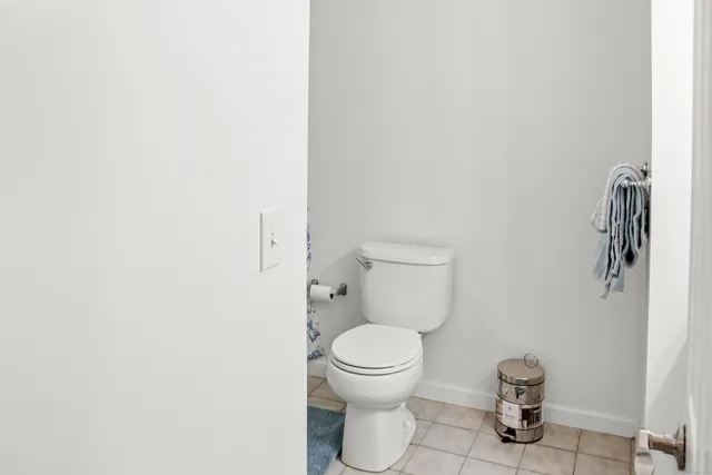 a bathroom with a toilet and a sink