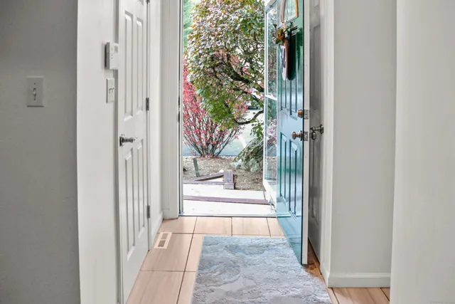 a view of a house with a tree in a house