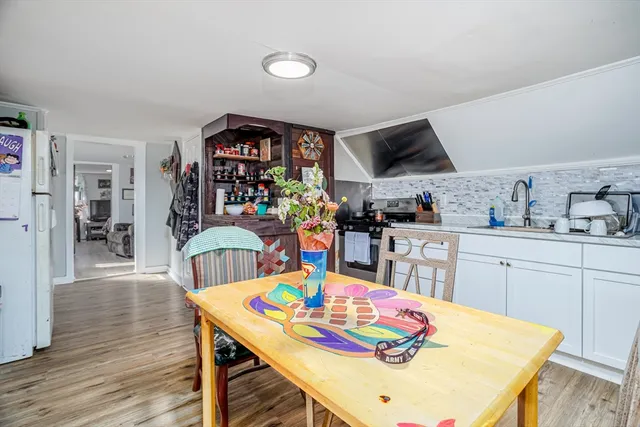 a view of a dining room with furniture
