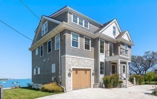 93 Kimball Beach Road Hingham, MA 02043 - Photo 32 of 36 a front view of a house with a yard