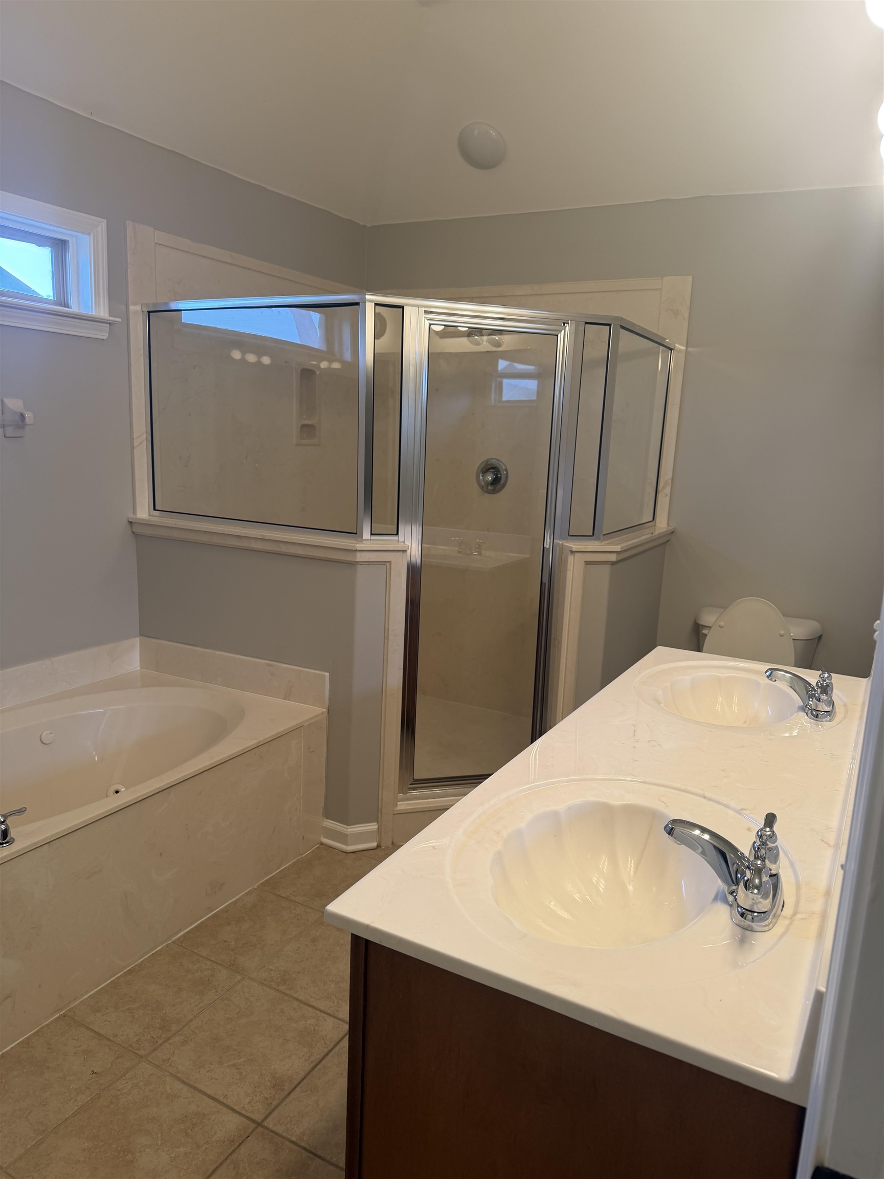 203 Estanaula Road Collierville, TN 38017 - Photo 12 of 31 a bathroom with a bathtub and a sink