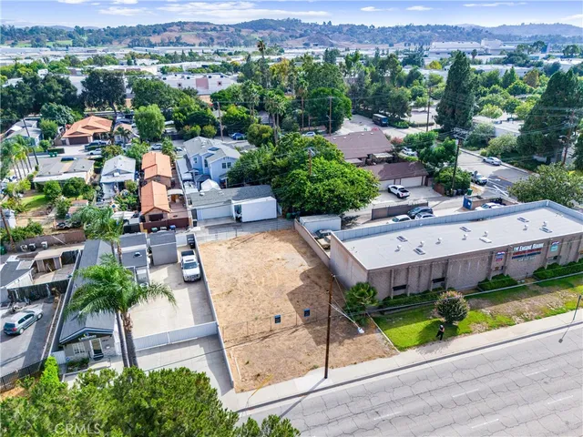 an aerial view of a house with a garden