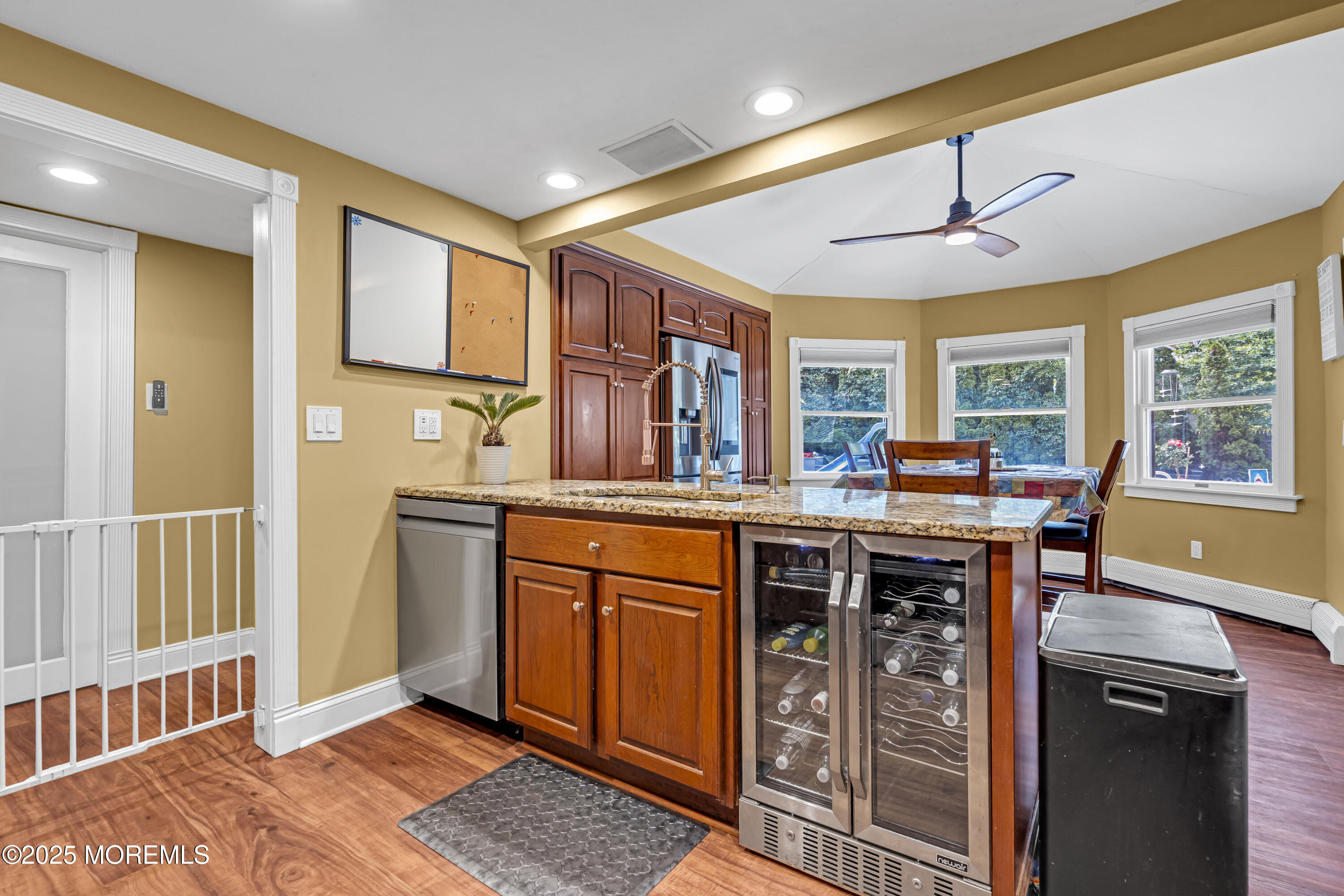 110 4th Avenue Tuckerton, NJ 08087 - Photo 13 of 38 a kitchen with stainless steel appliances granite countertop a stove cabinets and wooden floor