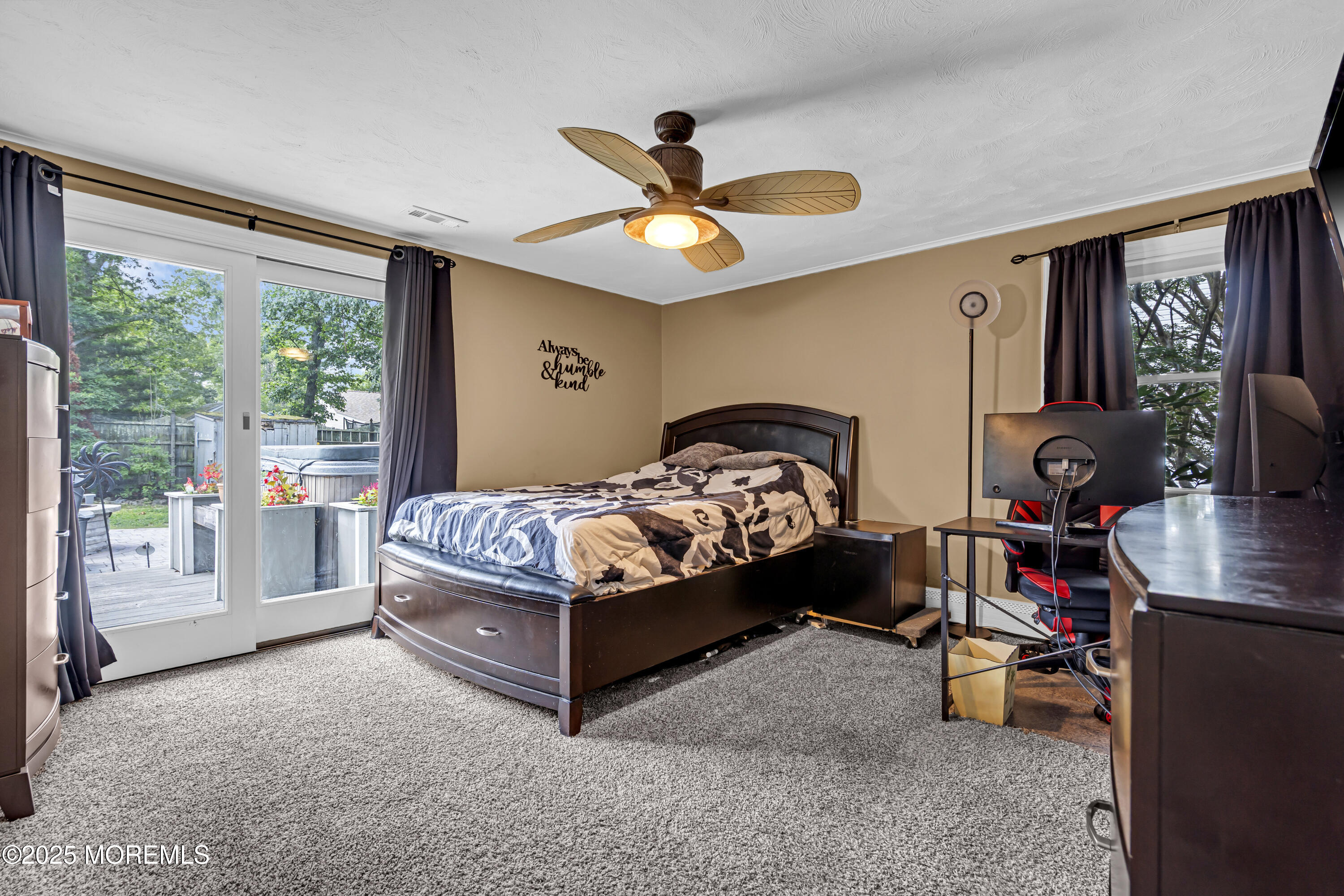 110 4th Avenue Tuckerton, NJ 08087 - Photo 17 of 38 a bedroom with a bed and a large window with the outer view