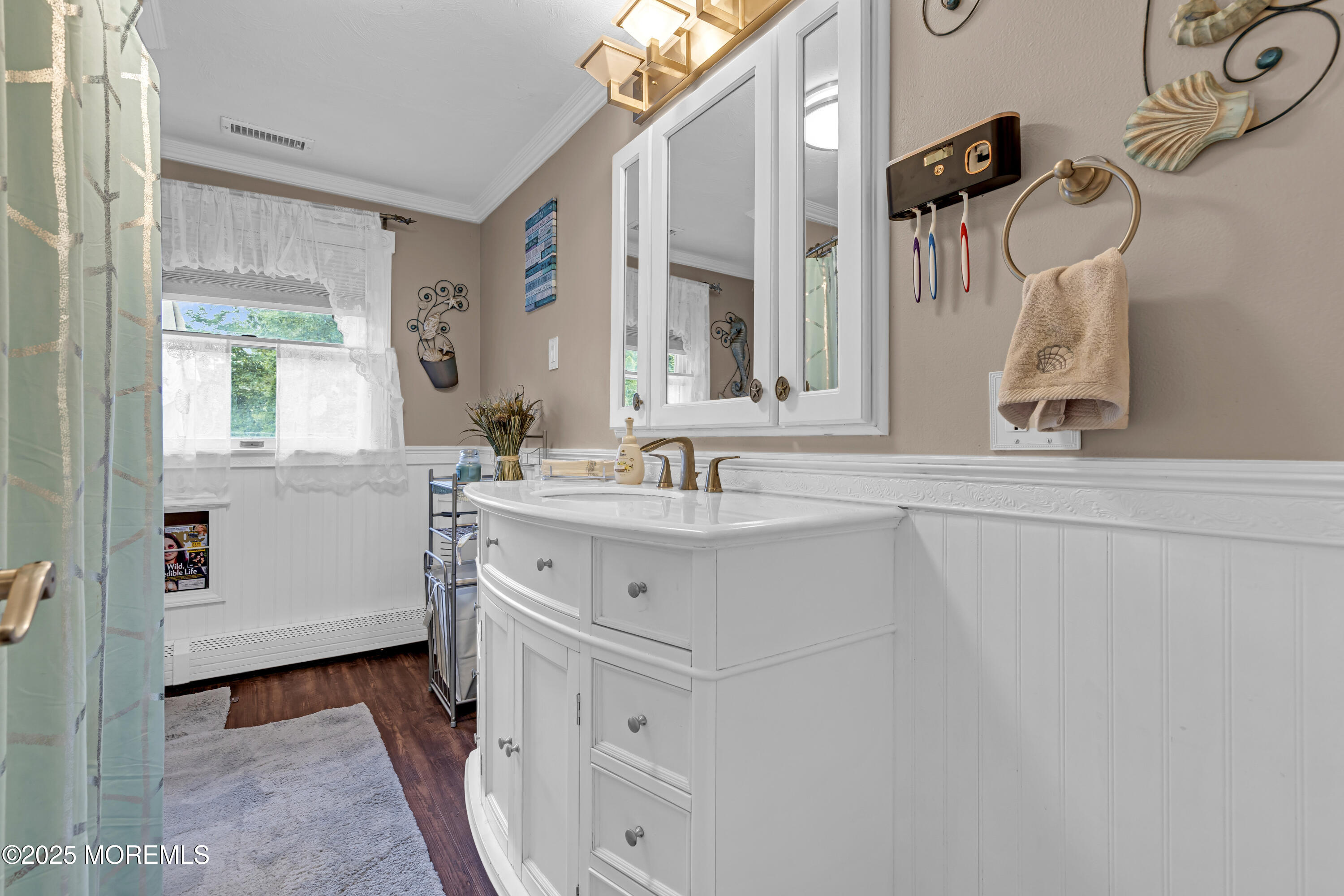 110 4th Avenue Tuckerton, NJ 08087 - Photo 18 of 38 a bathroom with a sink and a mirror