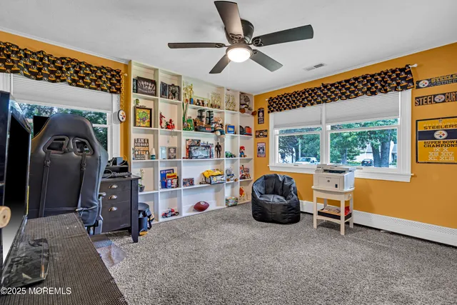 a bedroom with furniture and a window