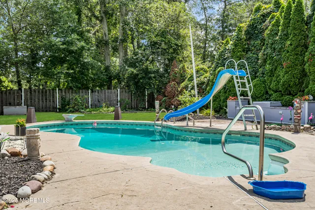a view of playground with a slide