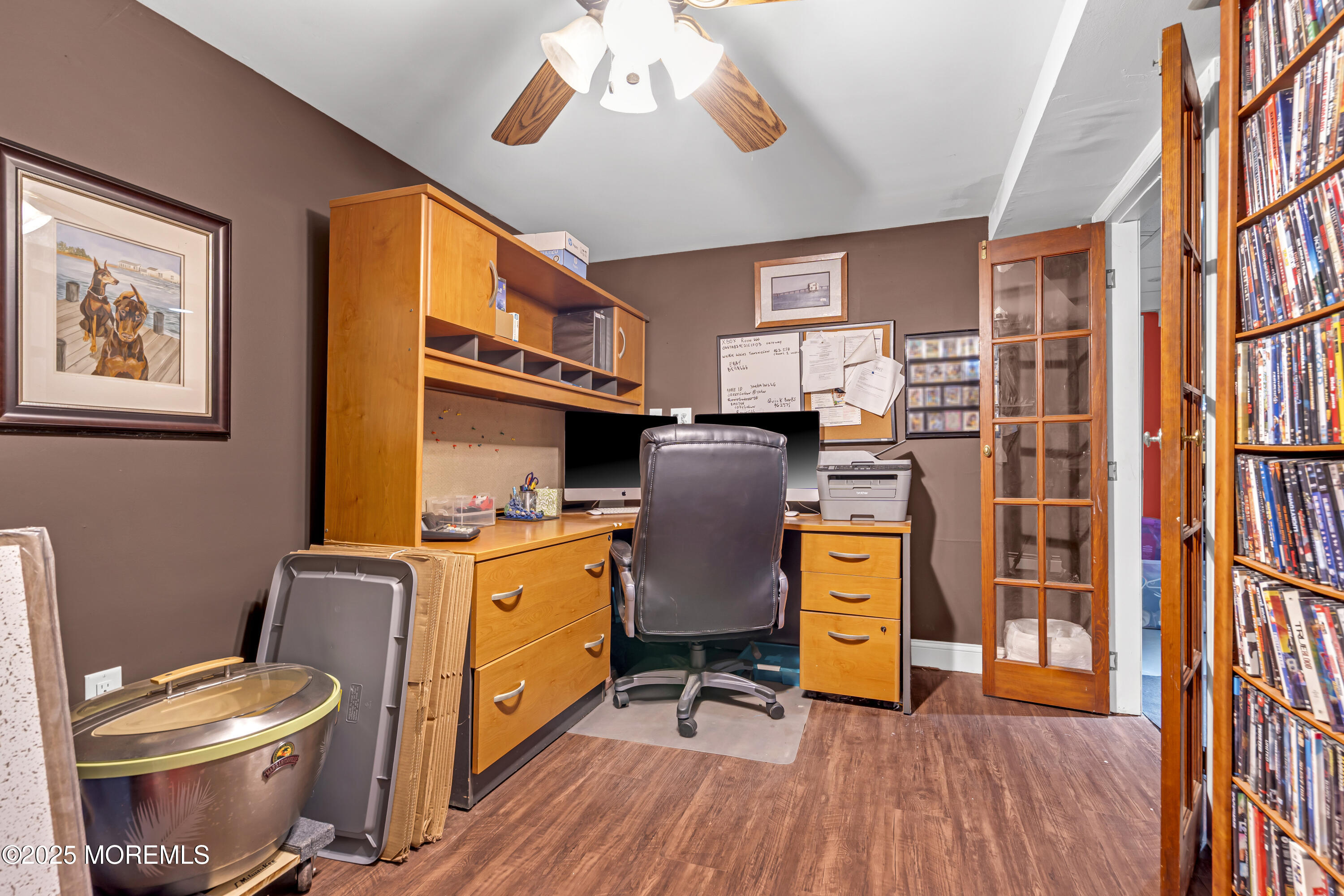 110 4th Avenue Tuckerton, NJ 08087 - Photo 25 of 38 a kitchen with stainless steel appliances a stove a window and wooden floors