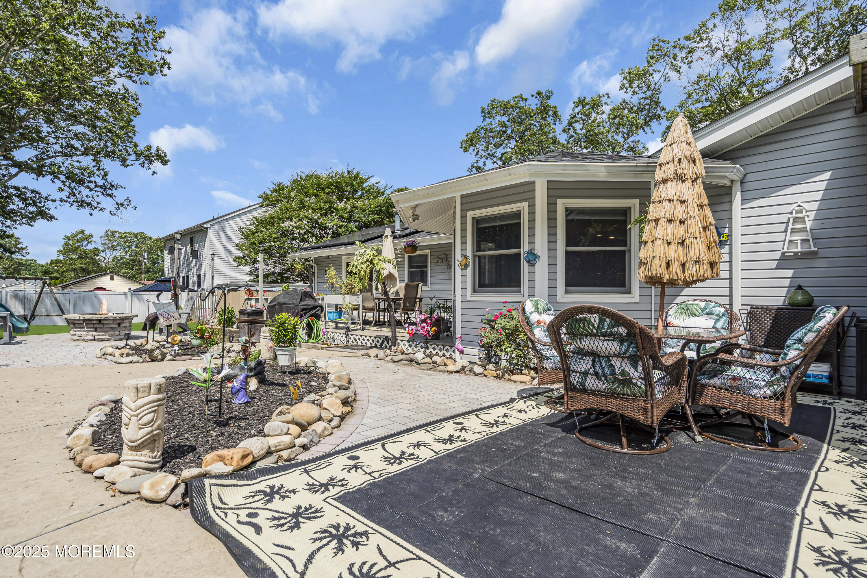 110 4th Avenue Tuckerton, NJ 08087 - Photo 29 of 38 a view of a patio with table and chairs and potted plants