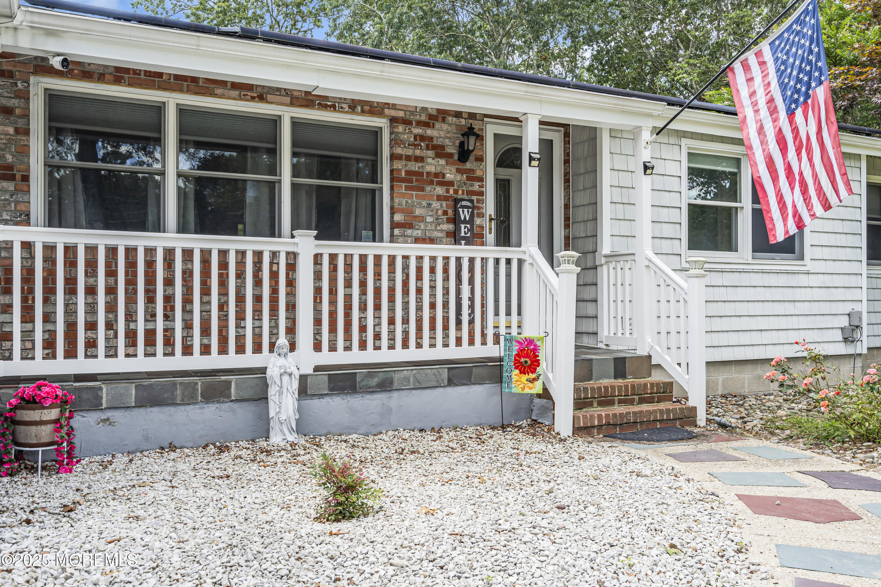 110 4th Avenue Tuckerton, NJ 08087 - Photo 3 of 38 a backyard of a house with wooden floor and fence