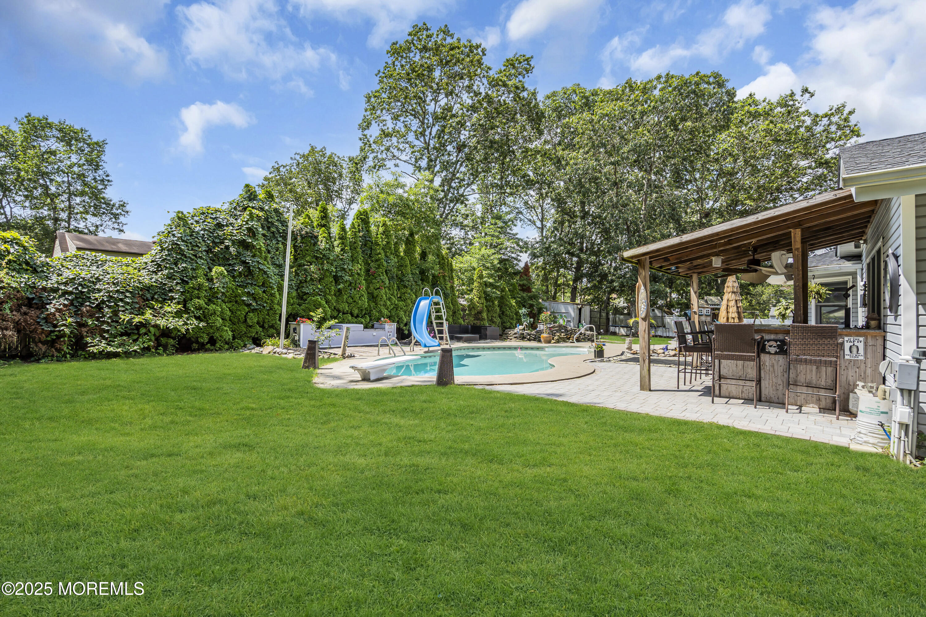 110 4th Avenue Tuckerton, NJ 08087 - Photo 35 of 38 a view of a chair and table in the garden