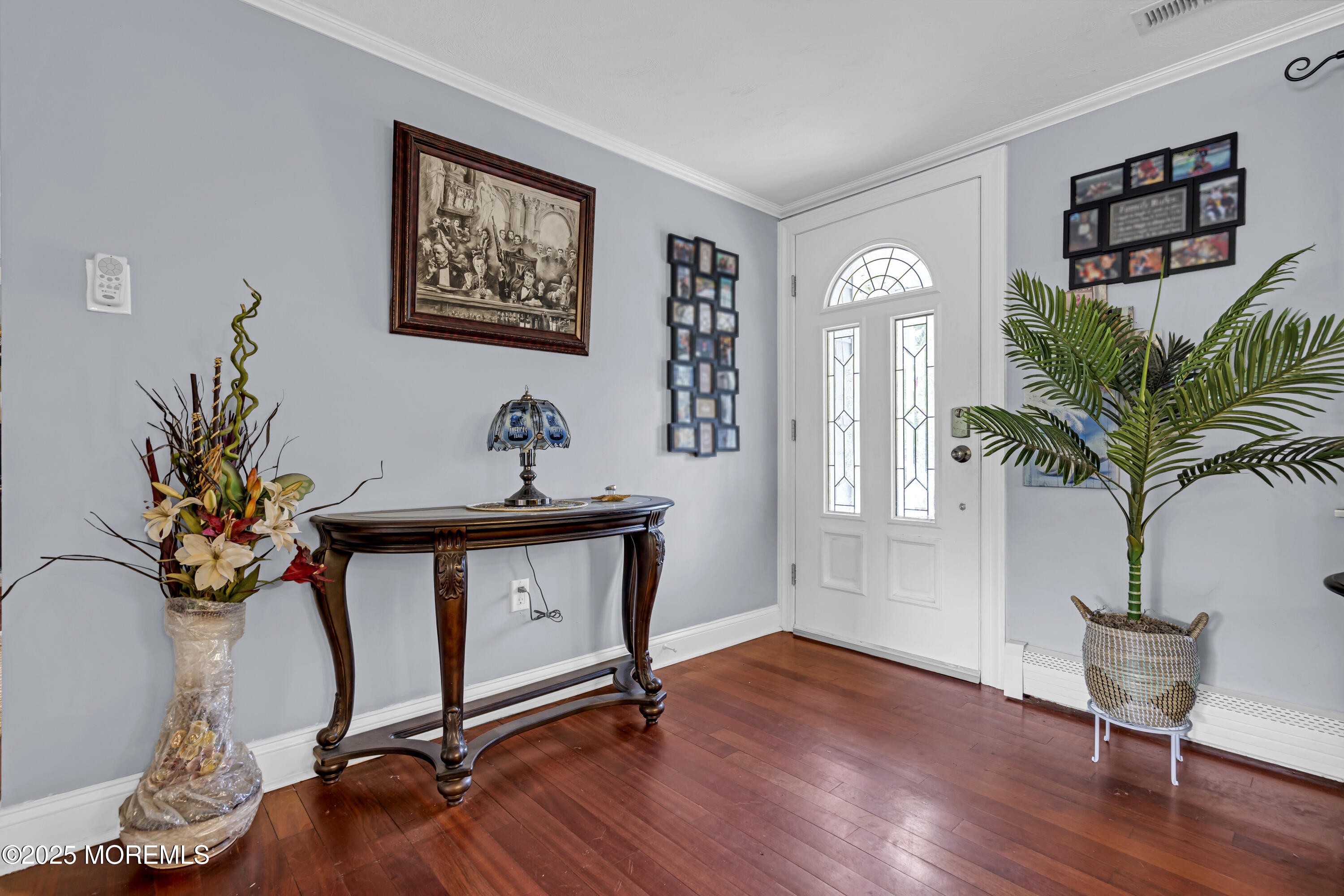 110 4th Avenue Tuckerton, NJ 08087 - Photo 4 of 38 a living room with furniture and a potted plant