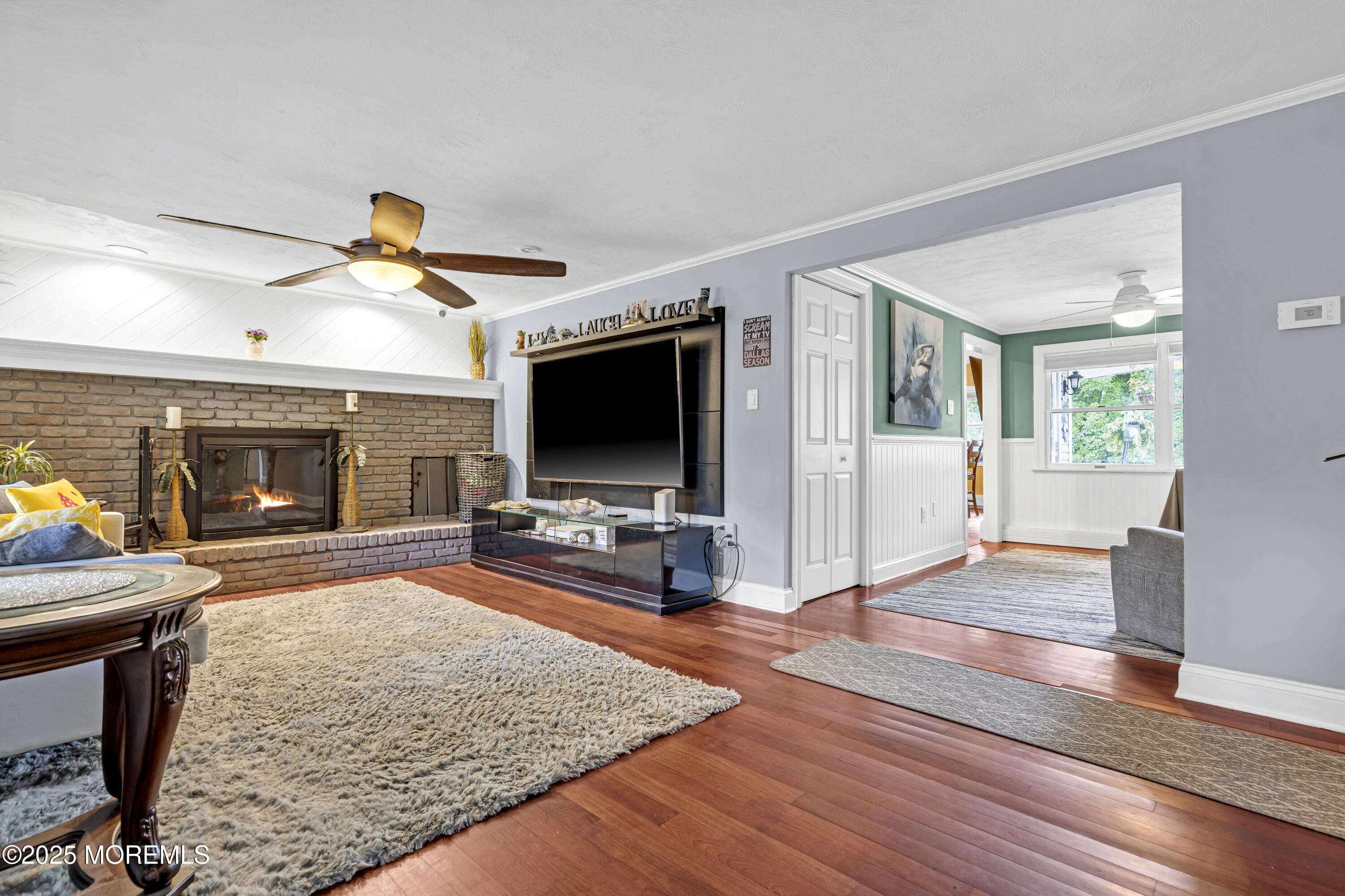 110 4th Avenue Tuckerton, NJ 08087 - Photo 6 of 38 a living room with furniture and a flat screen tv