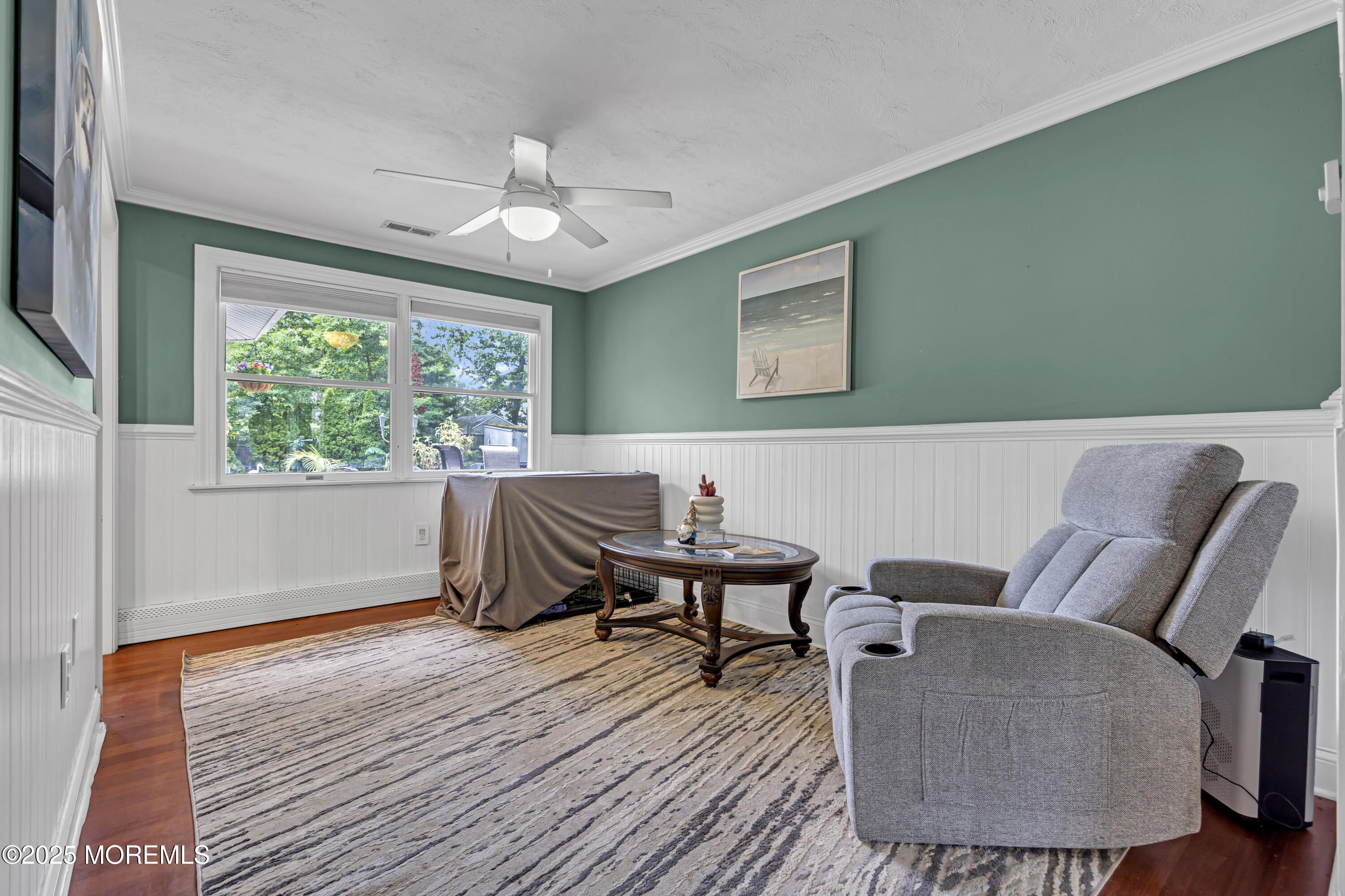 110 4th Avenue Tuckerton, NJ 08087 - Photo 7 of 38 a living room with furniture and a wooden floor
