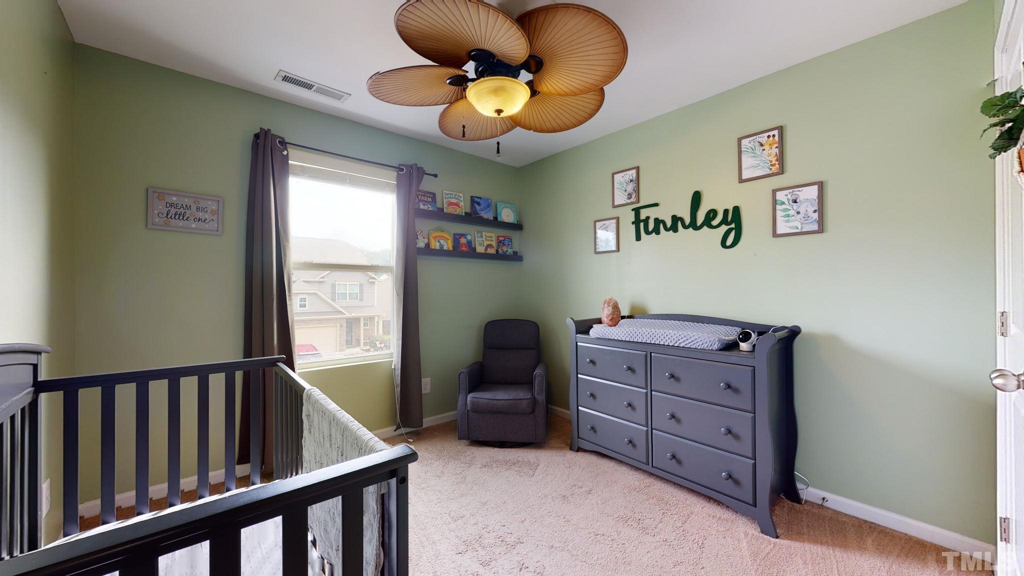 3558 Eastern Branch Road Raleigh, NC 27610 - Photo 23 of 25 a bedroom with a workspace
