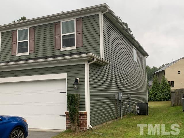 3558 Eastern Branch Road Raleigh, NC 27610 - Photo 3 of 25 a view of a house with backyard