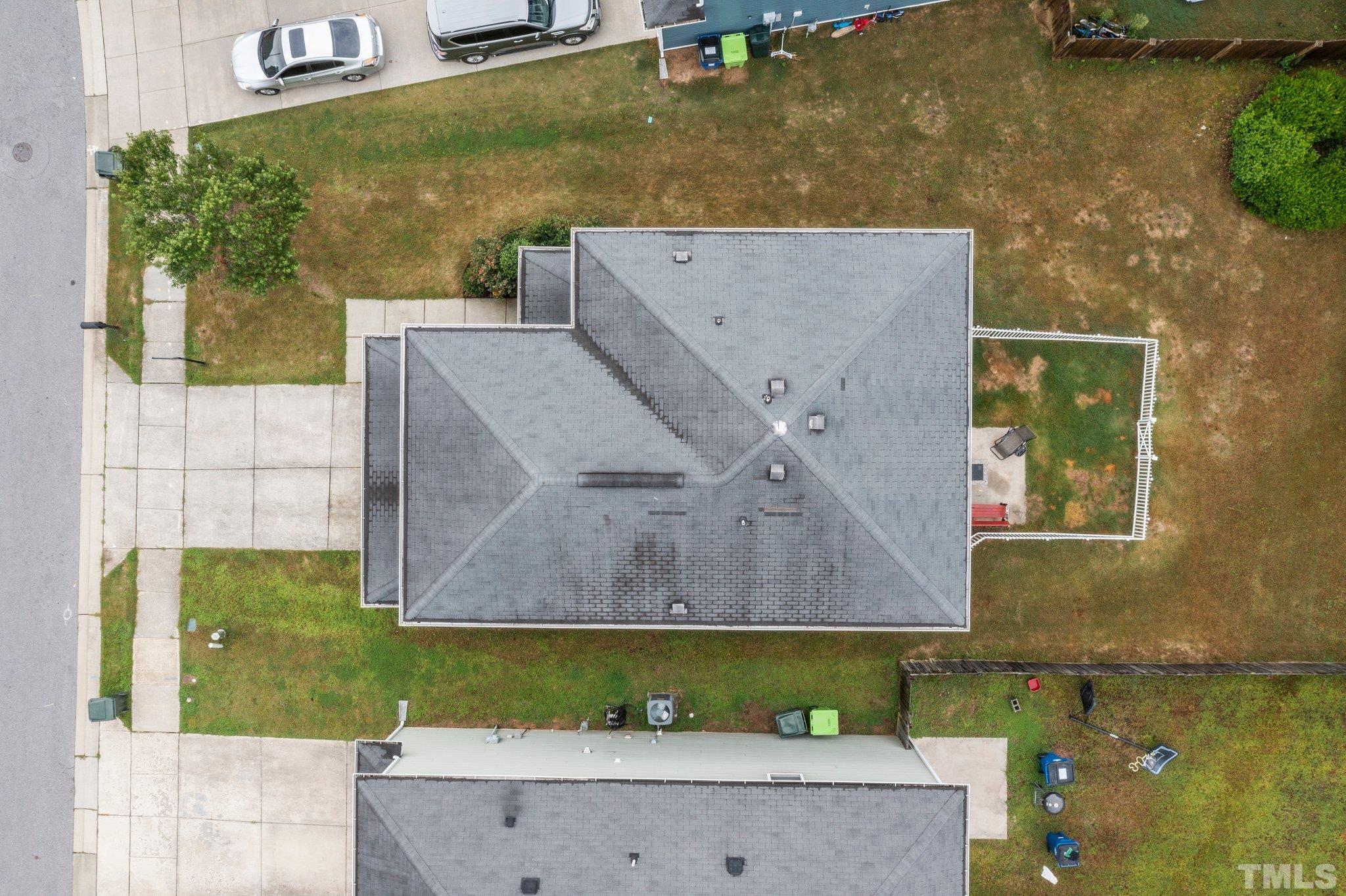 3558 Eastern Branch Road Raleigh, NC 27610 - Photo 4 of 25 an aerial view of a house with a yard