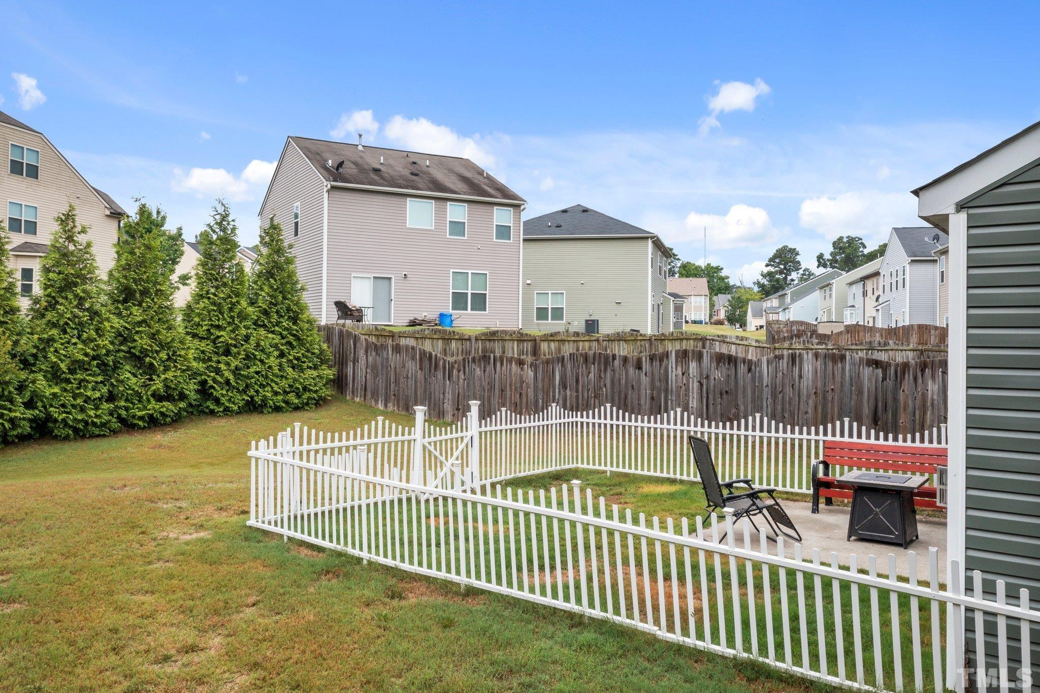 3558 Eastern Branch Road Raleigh, NC 27610 - Photo 6 of 25 a view of a house with backyard and deck