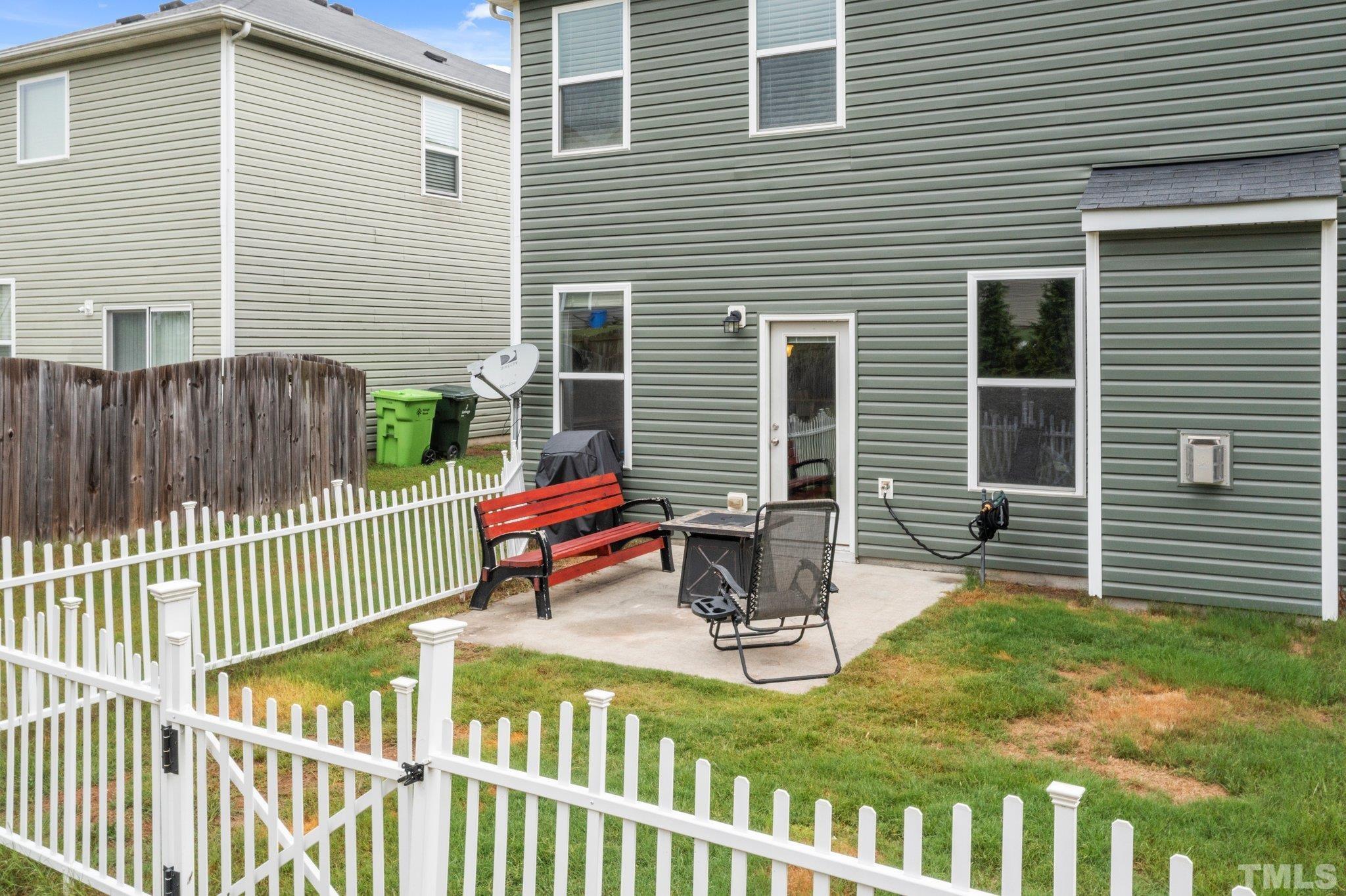 3558 Eastern Branch Road Raleigh, NC 27610 - Photo 7 of 25 a view of a house with backyard and sitting area