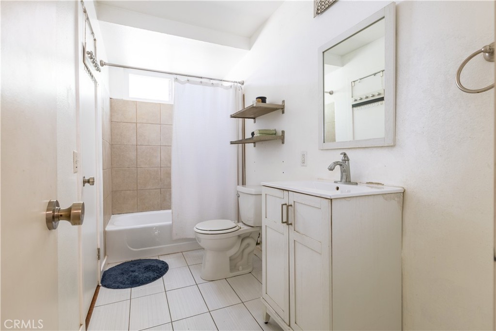 42015 Cosmic Drive Temecula, CA 92592 - Photo 16 of 27 a bathroom with a sink toilet and shower