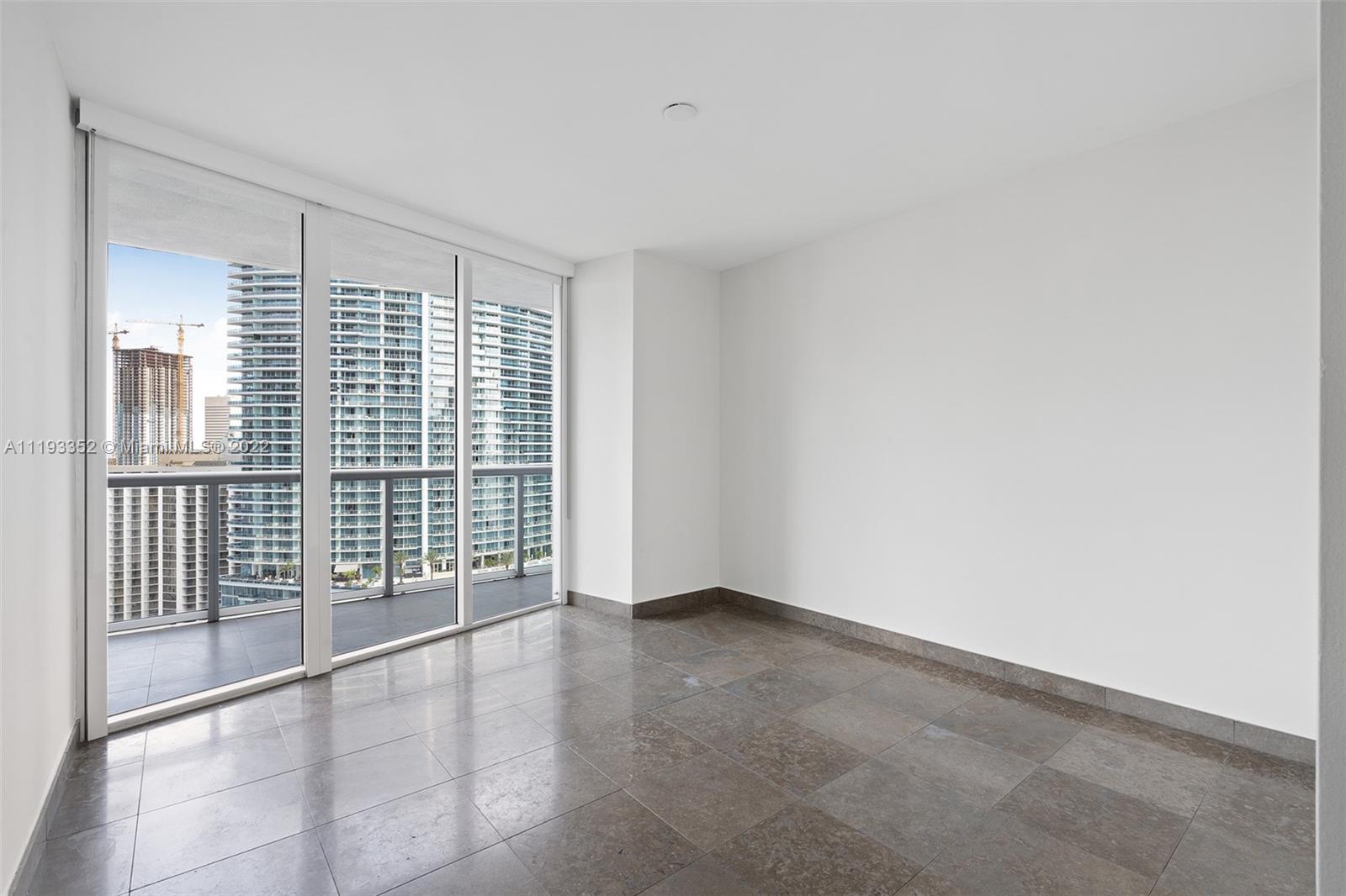 465 Brickell Avenue, Unit 2604 Miami, FL 33131 - Photo 11 of 23 a view of an empty room with a window