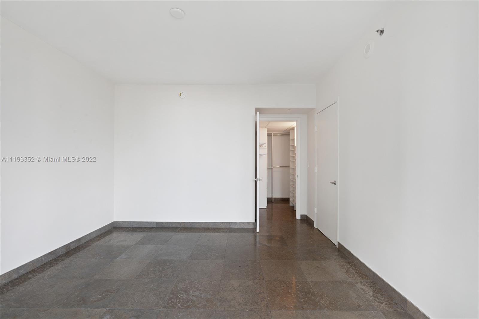 465 Brickell Avenue, Unit 2604 Miami, FL 33131 - Photo 12 of 23 a view of an empty room