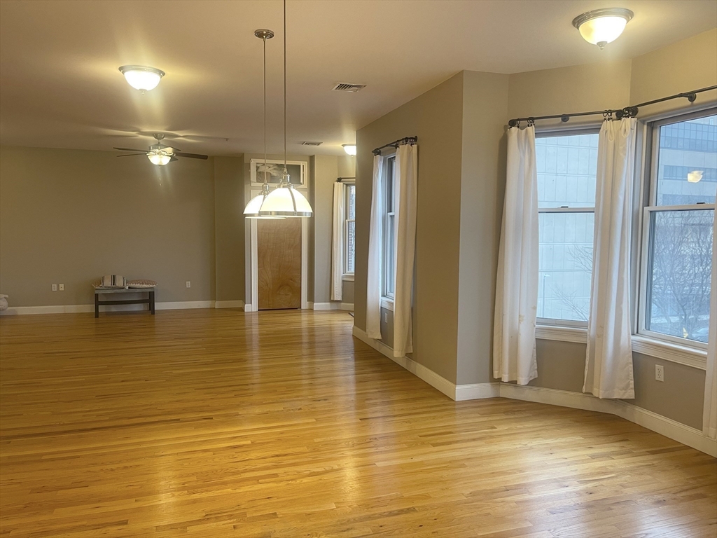 877 Harrison Avenue, Unit 6 Boston, MA 02118 - Photo 2 of 9 a view of a room with gym equipment