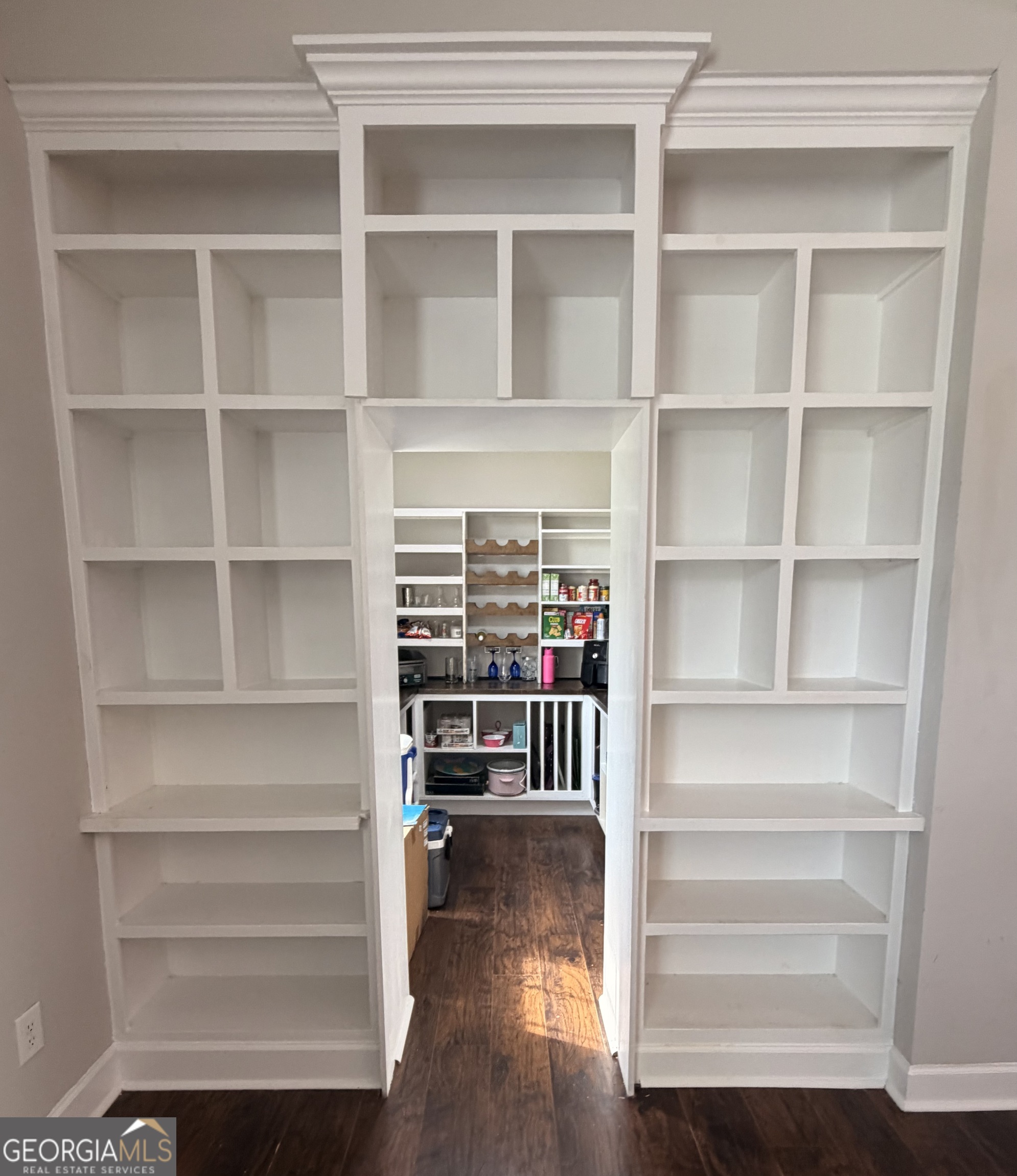 892 Perimeter Road Monticello, GA 31064 - Photo 15 of 38 a view of walk in closet with empty racks