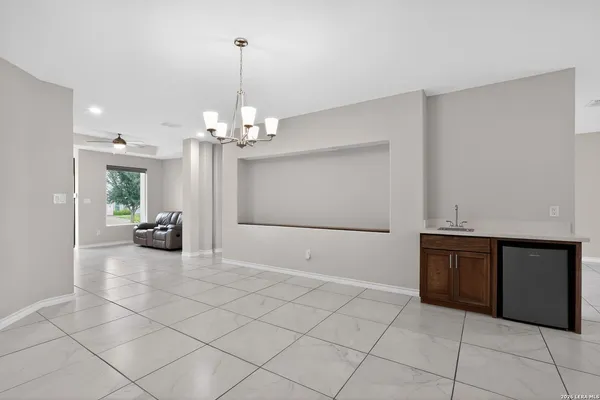 a view of a livingroom with a furniture