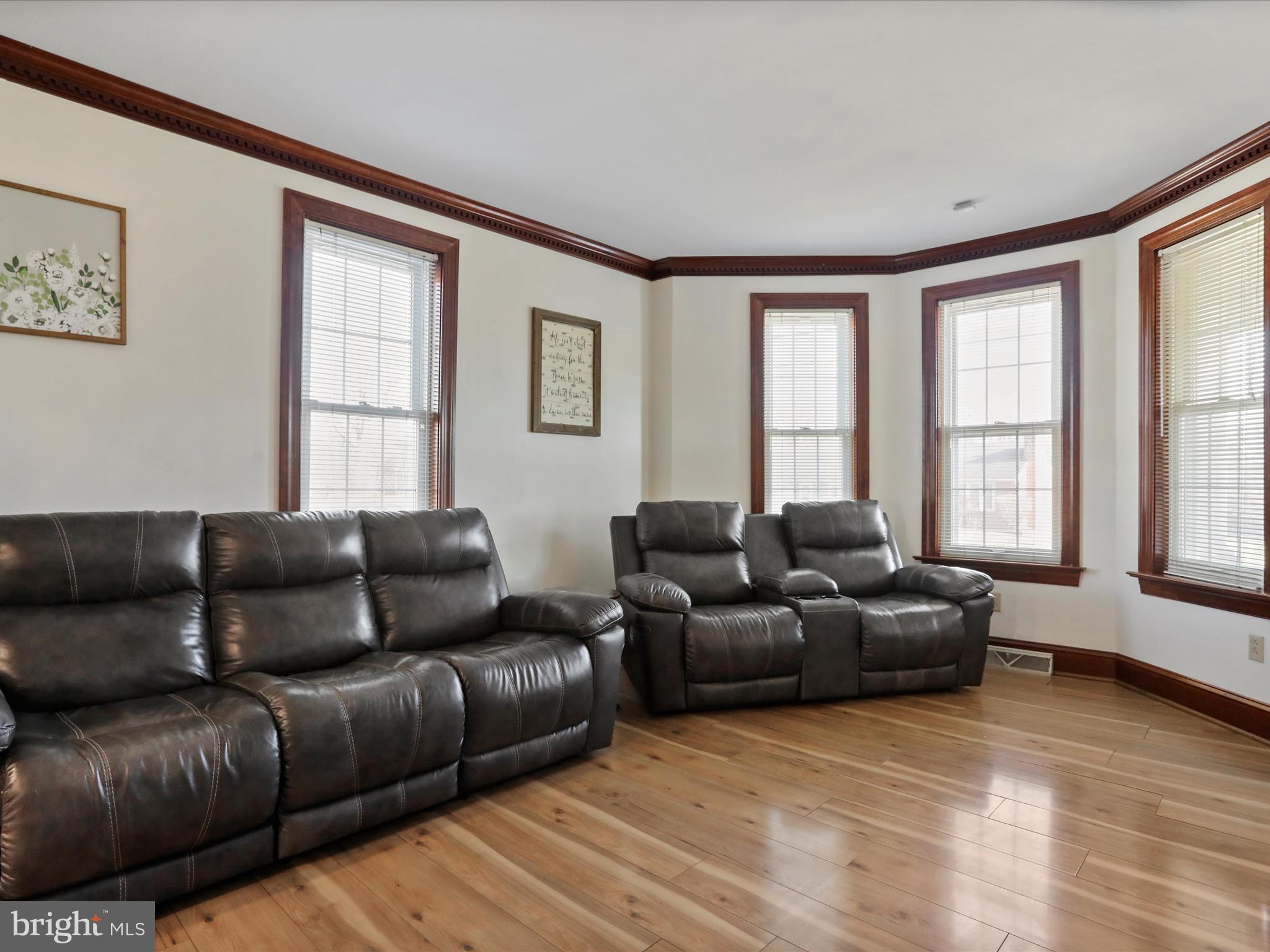 12368 Big Pool Road Clear Spring, MD 21722 - Photo 8 of 53 a living room with furniture and windows