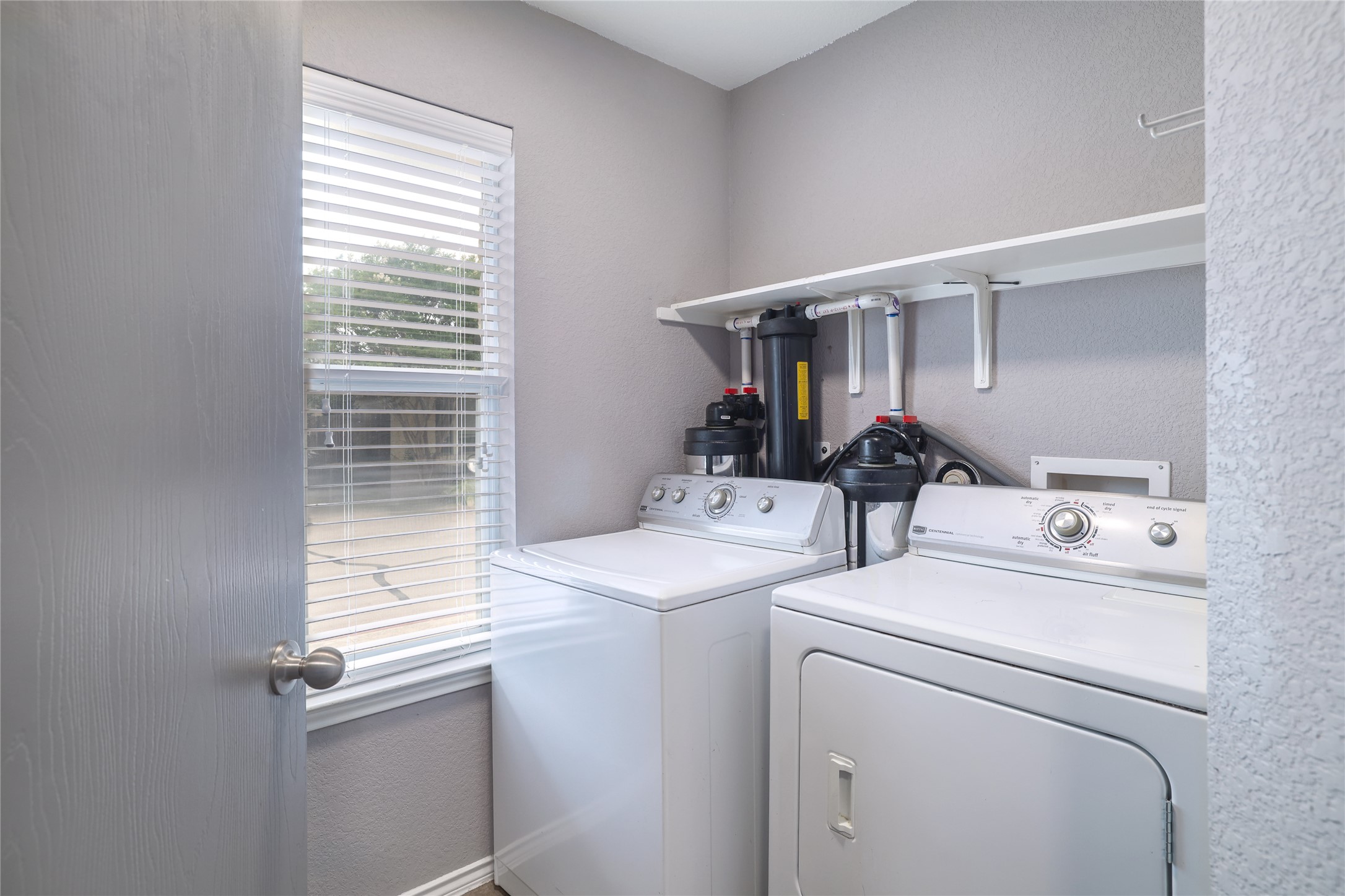4625 Credo Lane Austin, TX 78725 - Photo 25 of 34 Dedicated laundry area and a water softener