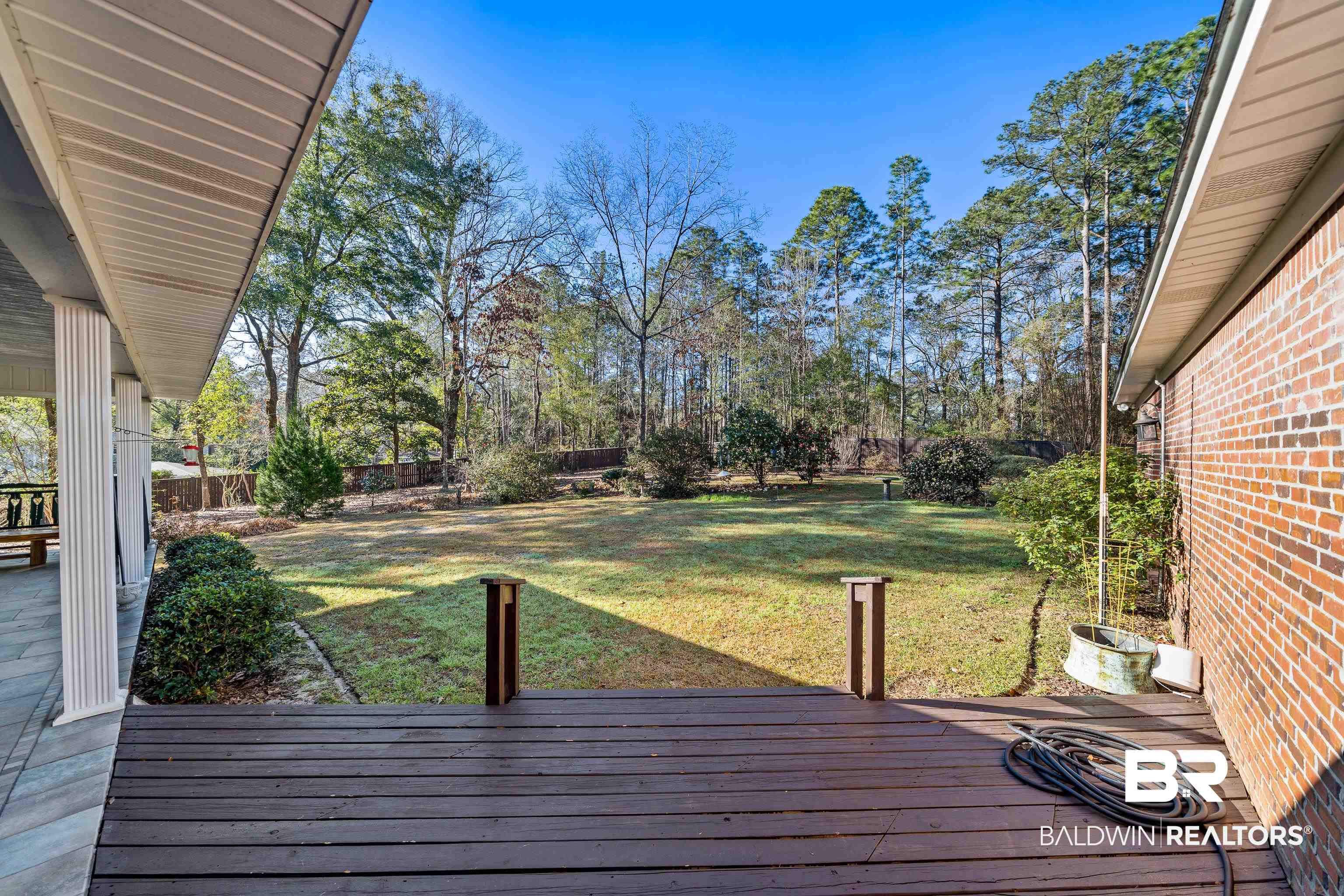 31267 Blakeley Ridge Court Spanish Fort, AL 36527 - Photo 50 of 61 Wooden deck featuring a lawn and fence