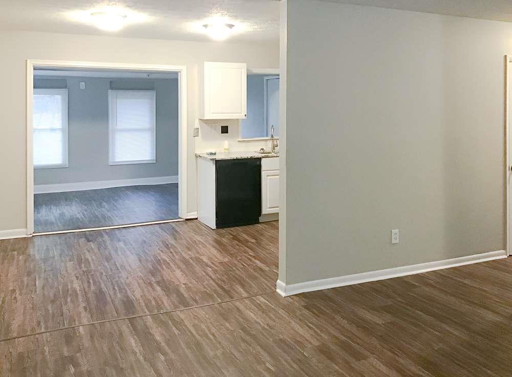 4666 Edwina Lane Southwest Atlanta, GA 30331 - Photo 8 of 15 a view of a kitchen with wooden floor and a sink