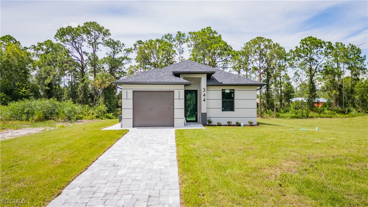 344 Nathan Avenue Lehigh Acres, FL 33974 - Photo 2 of 32