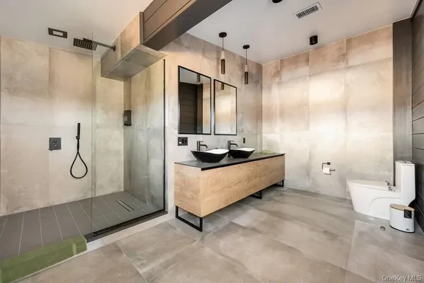 a bathroom with a sink and a toilet