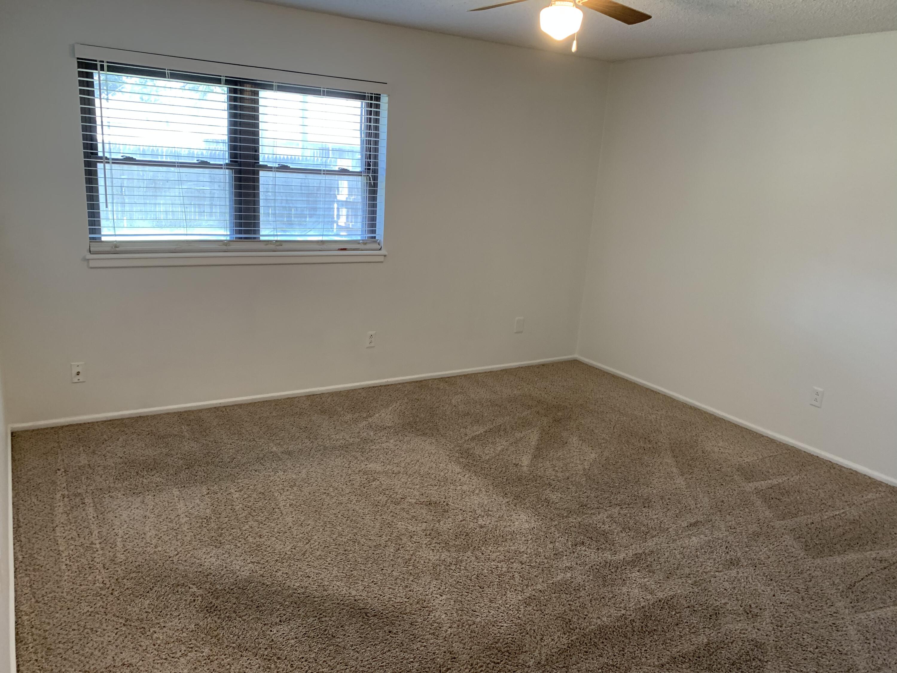 5201 15th Street Lubbock, TX 79416 - Photo 15 of 16 an empty room with a window