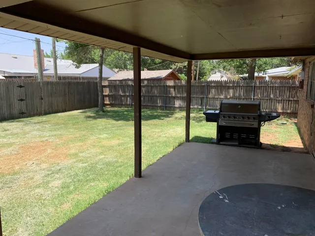 a view of a porch with a backyard