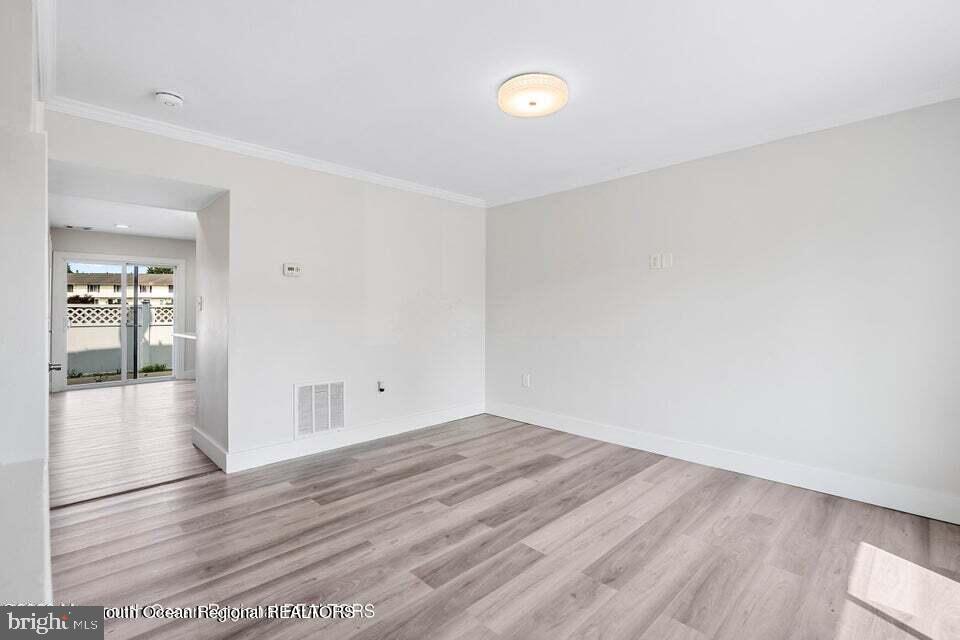 19 Creek Road Brick, NJ 08724 - Photo 4 of 10 wooden floor in an empty room