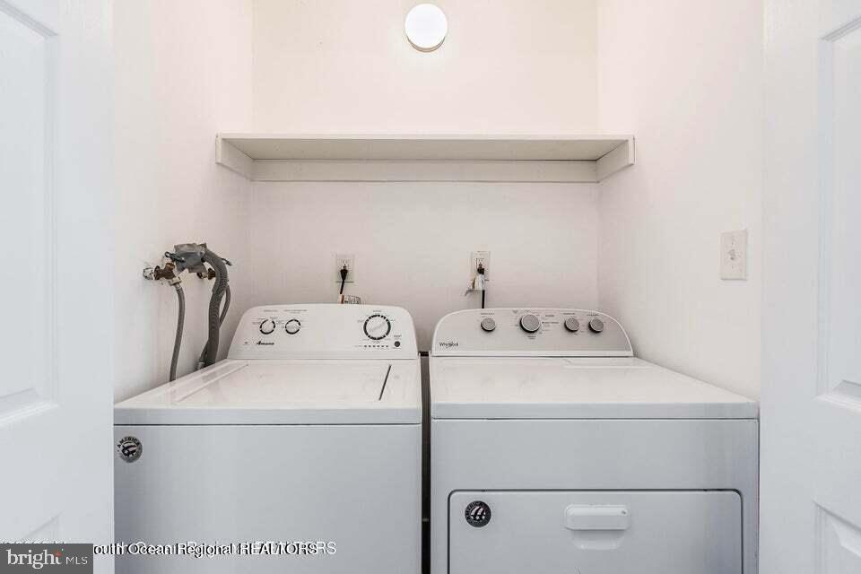 19 Creek Road Brick, NJ 08724 - Photo 6 of 10 a utility room with dryer and washer