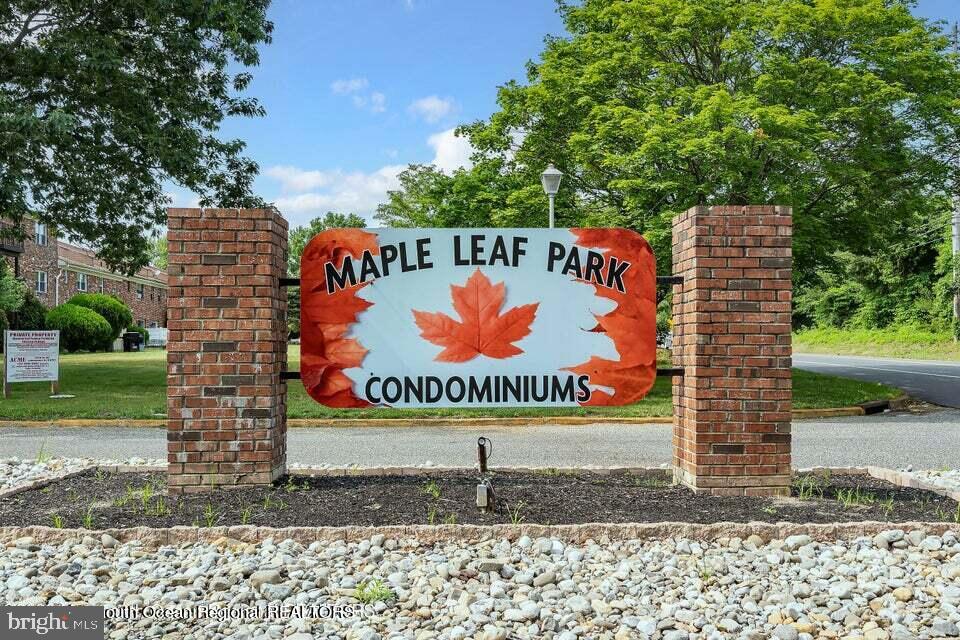 19 Creek Road Brick, NJ 08724 - Photo 9 of 10 a sign on the side of the road