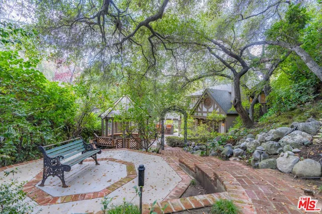 a view of kitchen with cabinets and wooden floor