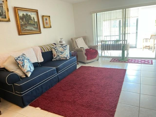 9569 West McNab Road, Unit 9569 Tamarac, FL 33321 - Photo 15 of 39 Living area toward screened porch