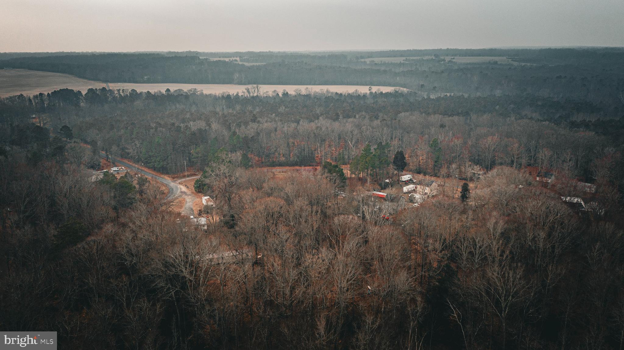 Tbd Parrish Lane Colonial Beach, VA 22443 - Photo 12 of 18 a view of a lake with a mountain in the back