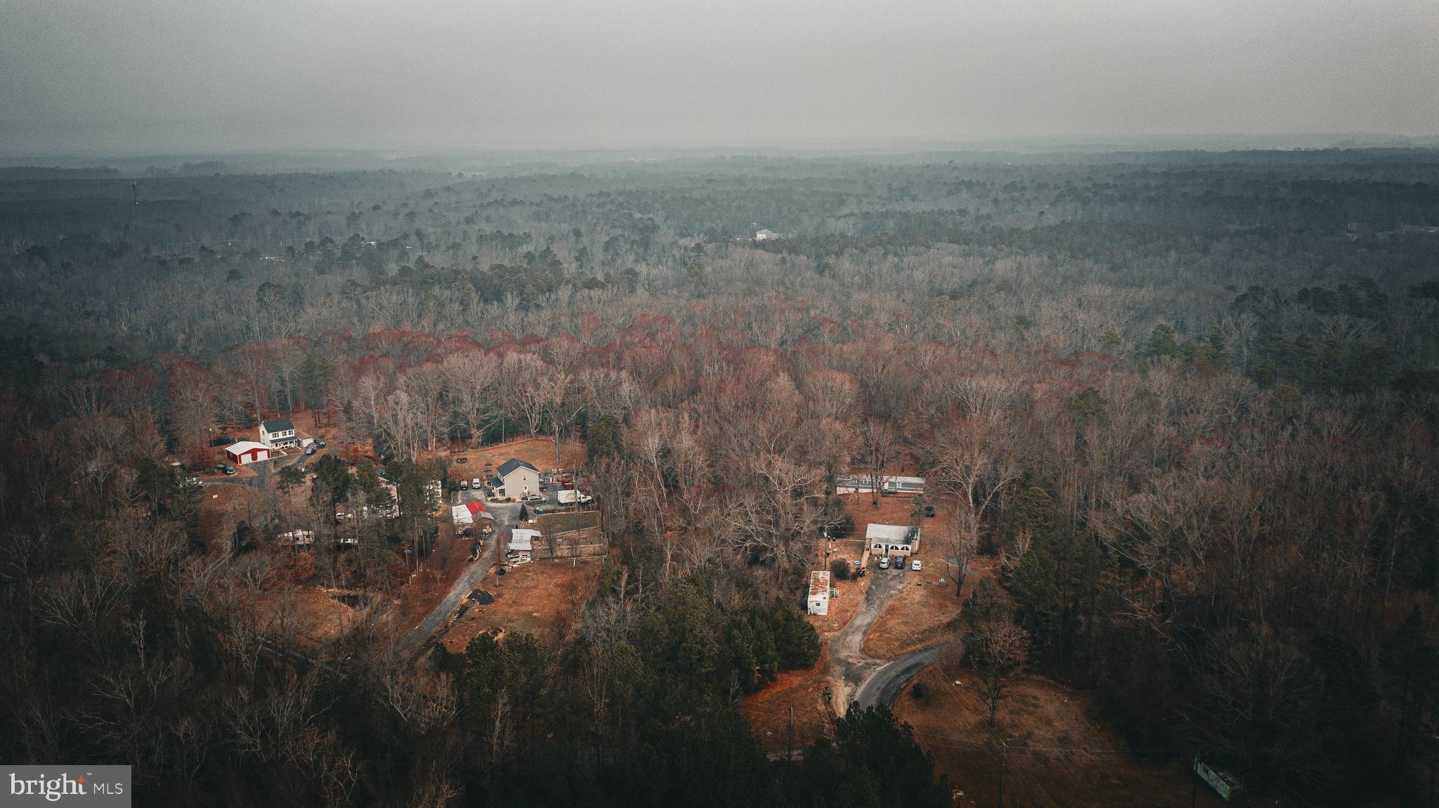 Tbd Parrish Lane Colonial Beach, VA 22443 - Photo 2 of 18 a view of a house with a yard