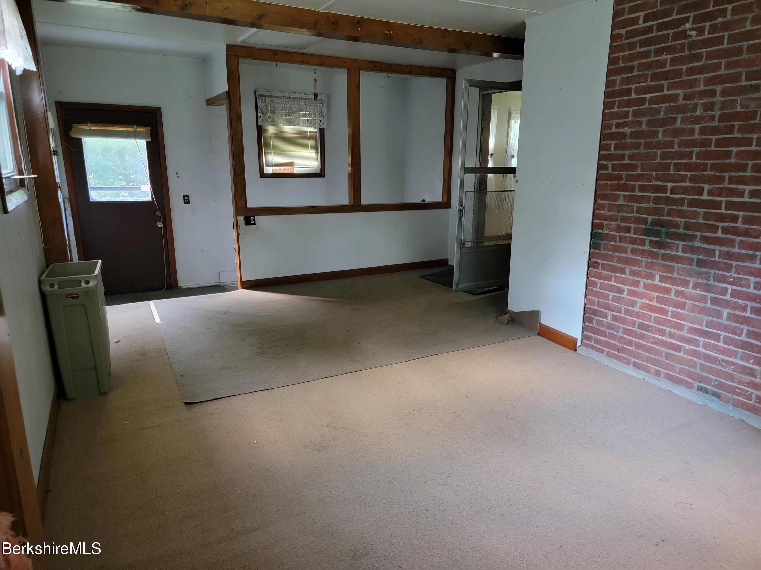 1096 South State Road Cheshire, MA 01225 - Photo 15 of 41 a sunroom to backdoor, basement access &