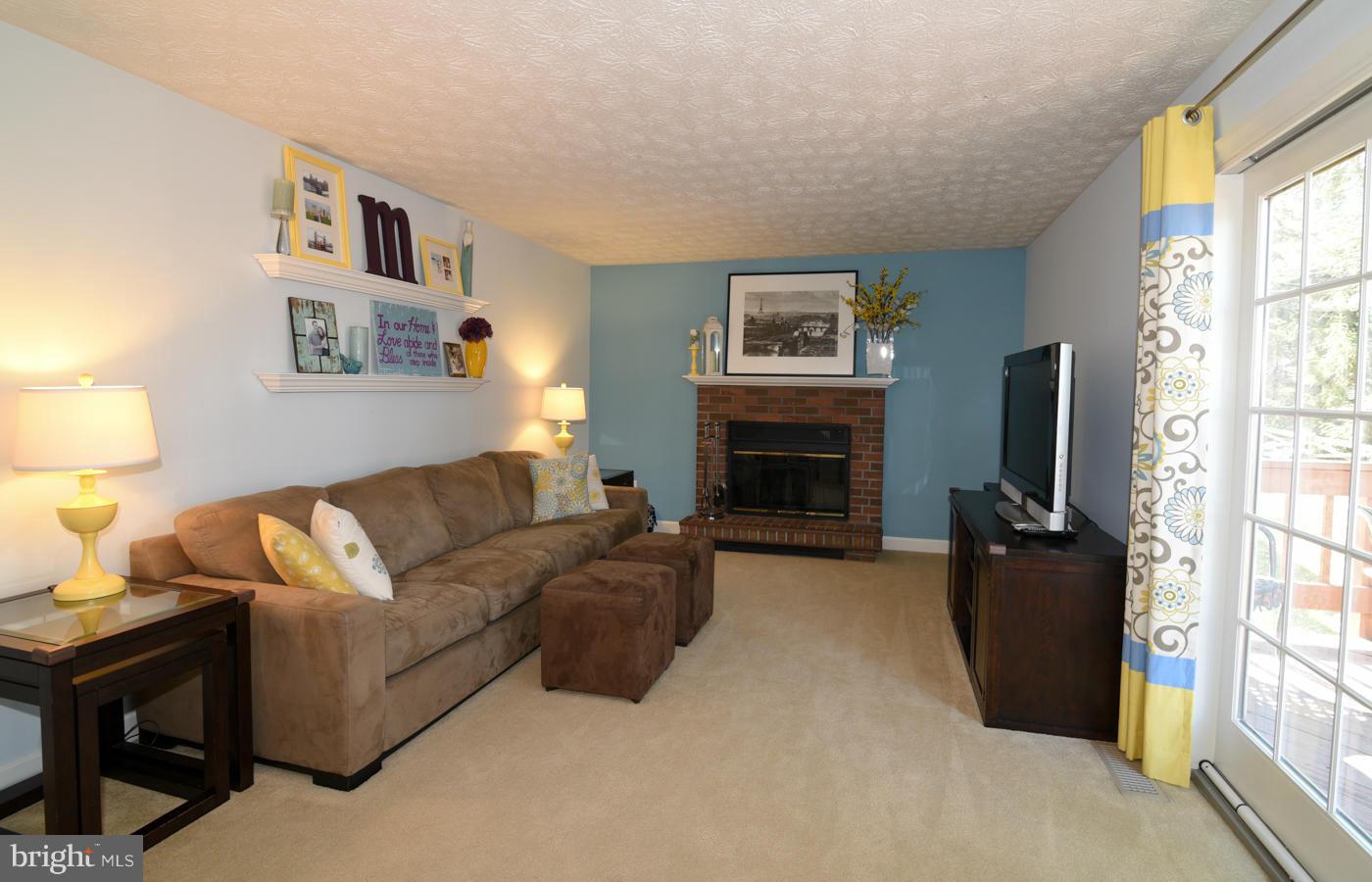 12410 Rock Ridge Road Herndon, VA 20170 - Photo 12 of 30 Family Room features a wood-burning fireplace