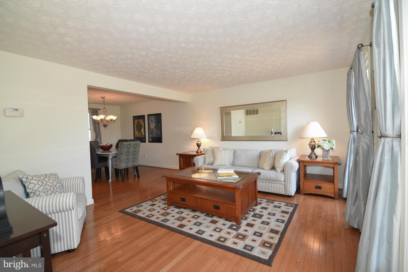 12410 Rock Ridge Road Herndon, VA 20170 - Photo 3 of 30 Living Room features hardwood floors