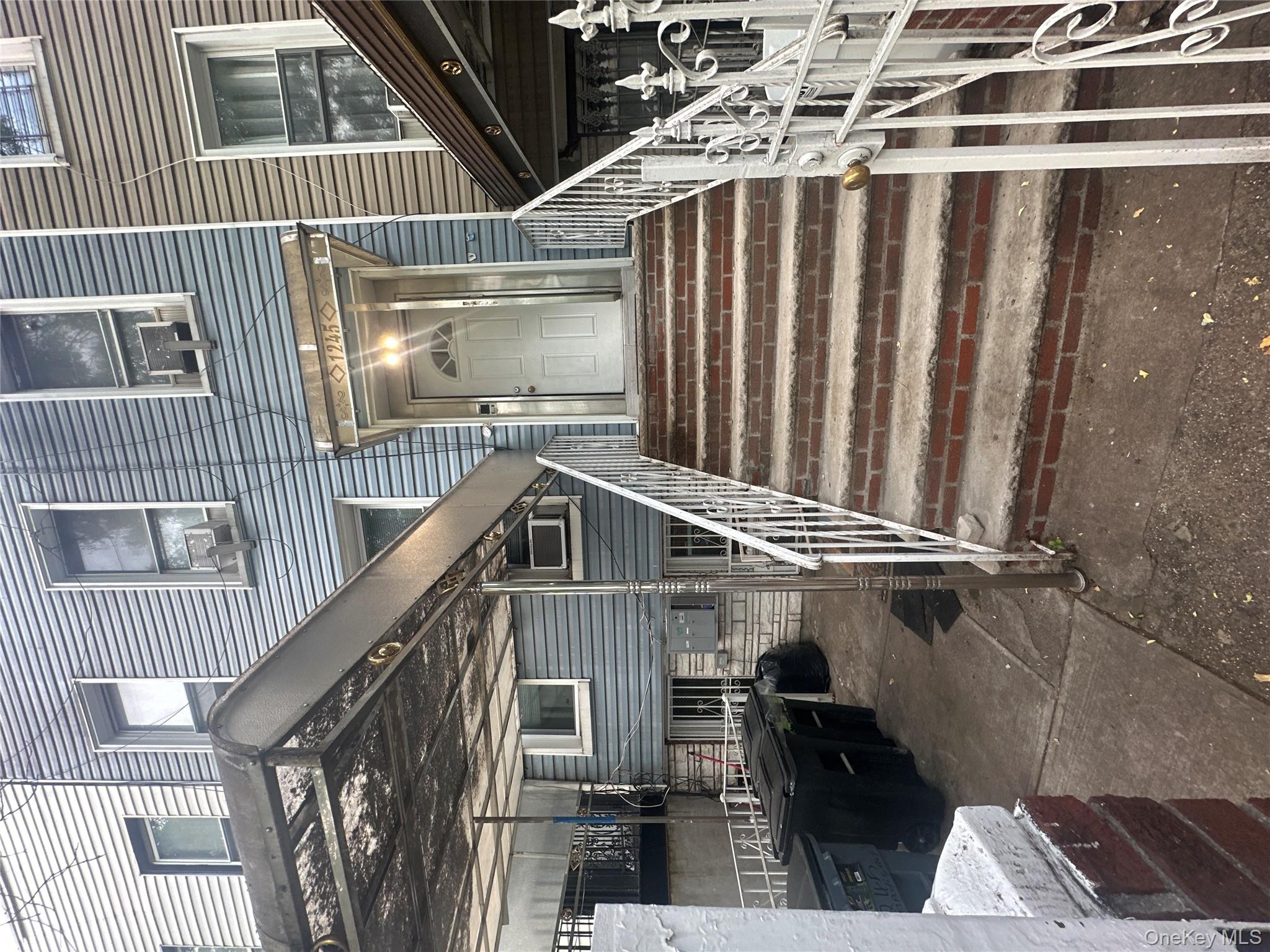 1245 Madison Street Brooklyn, NY 11221 - Photo 8 of 15 a view of a house with backyard and deck